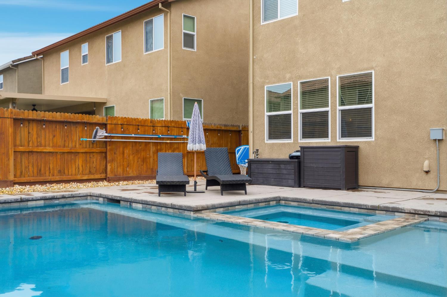 7240 Encore Way Roseville, CA 95747 - Photo 47 of 52 a view of a house with pool and sitting area