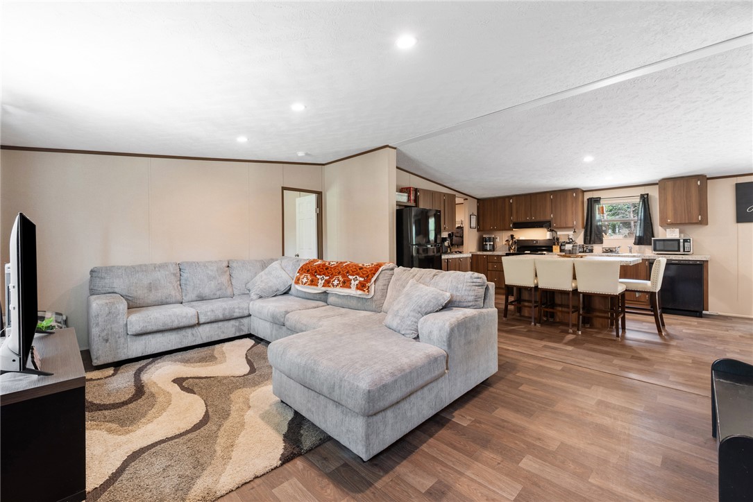 309 Tanglewood Lane Somerville, TX 77879 - Photo 3 of 21 a living room with furniture and a couch