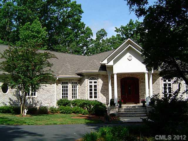 2626 Medlin Road Monroe, NC 28112 - Photo 2 of 16 a front view of a house with a yard