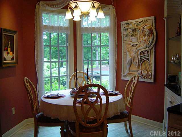 2626 Medlin Road Monroe, NC 28112 - Photo 13 of 16 a view of a dining room with furniture window and outside view