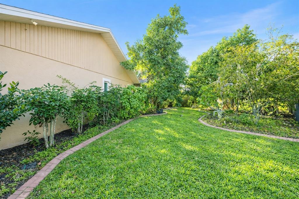 1627 Del Monte Court Venice, FL 34293 - Photo 40 of 78 a view of yard with green space