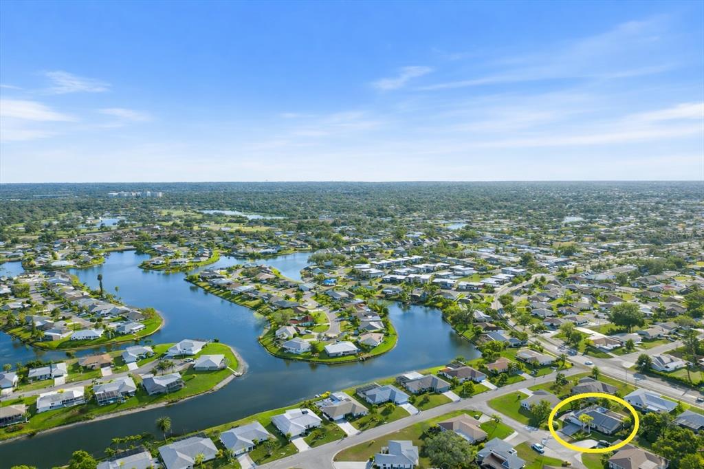 1627 Del Monte Court Venice, FL 34293 - Photo 44 of 78 an aerial view of residential houses with outdoor space