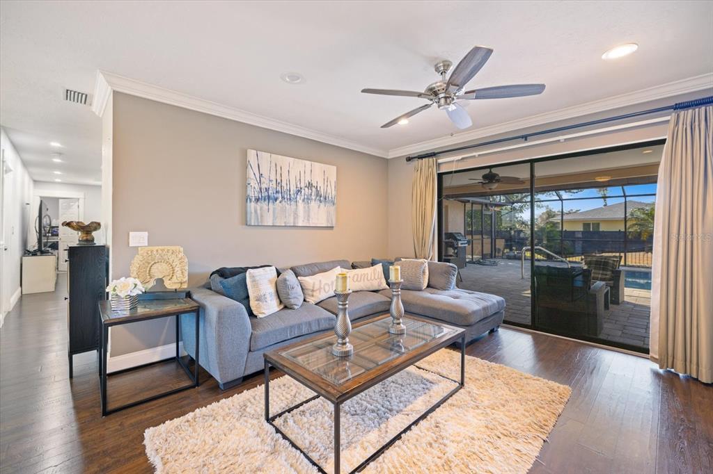 1627 Del Monte Court Venice, FL 34293 - Photo 8 of 78 a living room with furniture and a large window