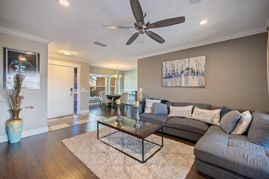 1627 Del Monte Court Venice, FL 34293 - Photo 9 of 78 a living room with furniture and a view of kitchen