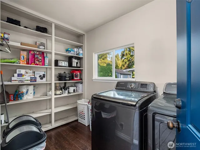 a utility room with washer and dryer