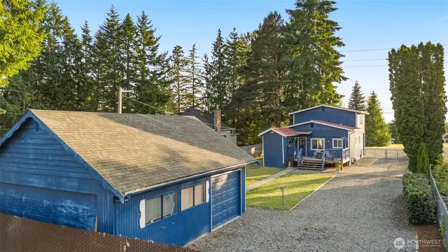 a view of a house with large outdoor space