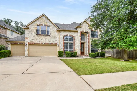 front view of a house and a yard