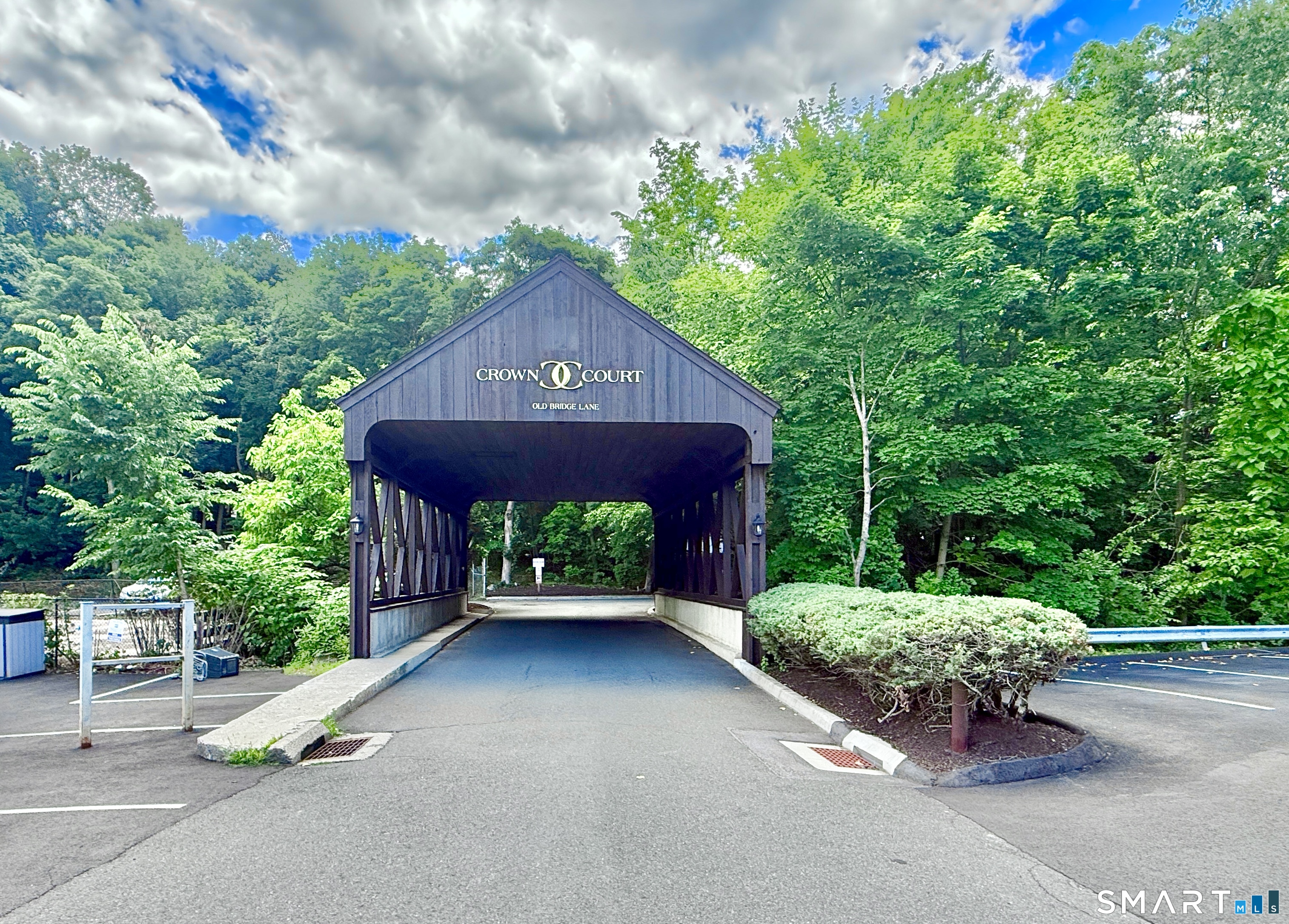 34 A Padanaram Road, Unit 127 Danbury, CT 06811 - Photo 1 of 13 a front view of a house with a yard