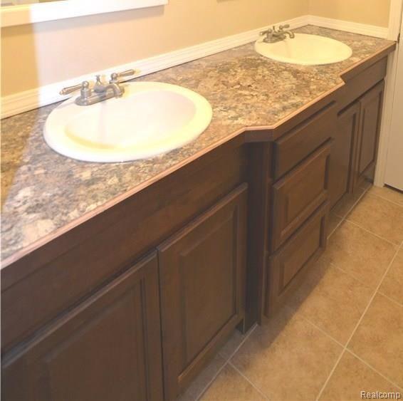 2130 Houser Road Holly, MI 48442 - Photo 17 of 21 PRISTINE MASTER WITH DUAL SINKS