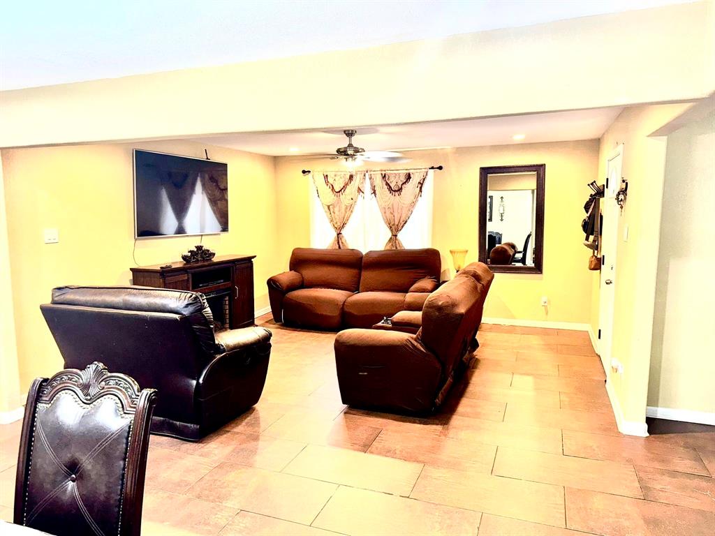 5216 Terrace Trail Sansom Park, TX 76114 - Photo 21 of 34 a living room with furniture and a large window