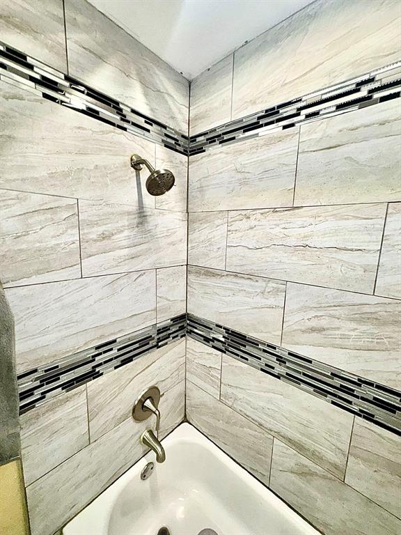 5216 Terrace Trail Sansom Park, TX 76114 - Photo 23 of 34 a bathroom with a shower and a sink