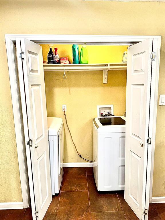 5216 Terrace Trail Sansom Park, TX 76114 - Photo 25 of 34 a utility room with wooden floor washer and dryer