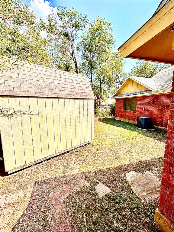 5216 Terrace Trail Sansom Park, TX 76114 - Photo 31 of 34 a view of a house with a yard and sitting area