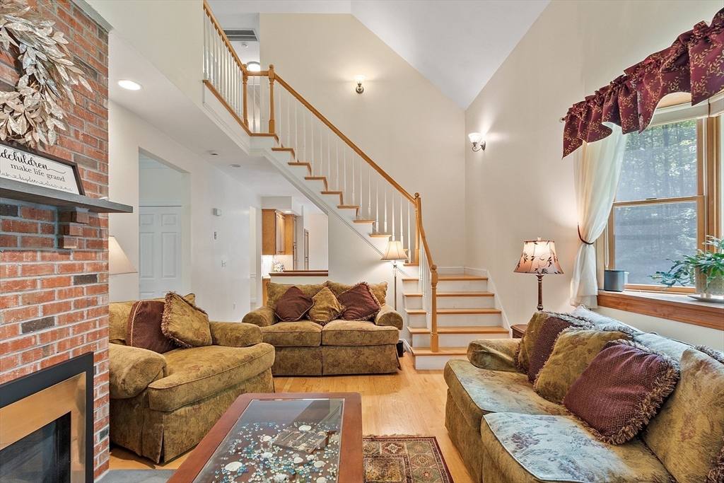 169 Narrows Road Westminster, MA 01473 - Photo 14 of 41 a living room with furniture and a chandelier