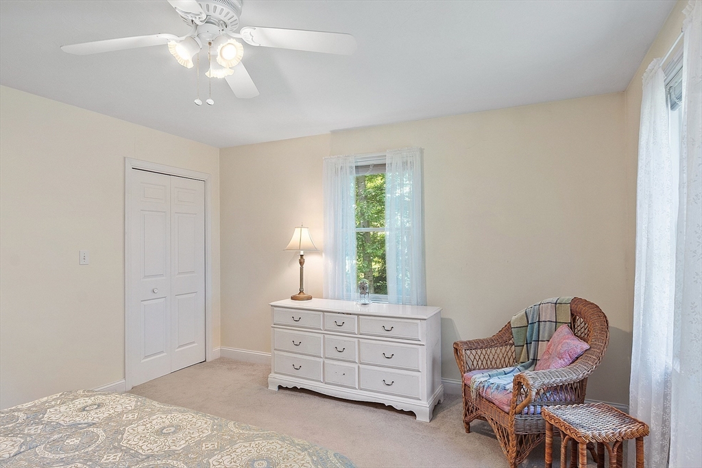 169 Narrows Road Westminster, MA 01473 - Photo 23 of 41 a bedroom with a bed and a dresser in it