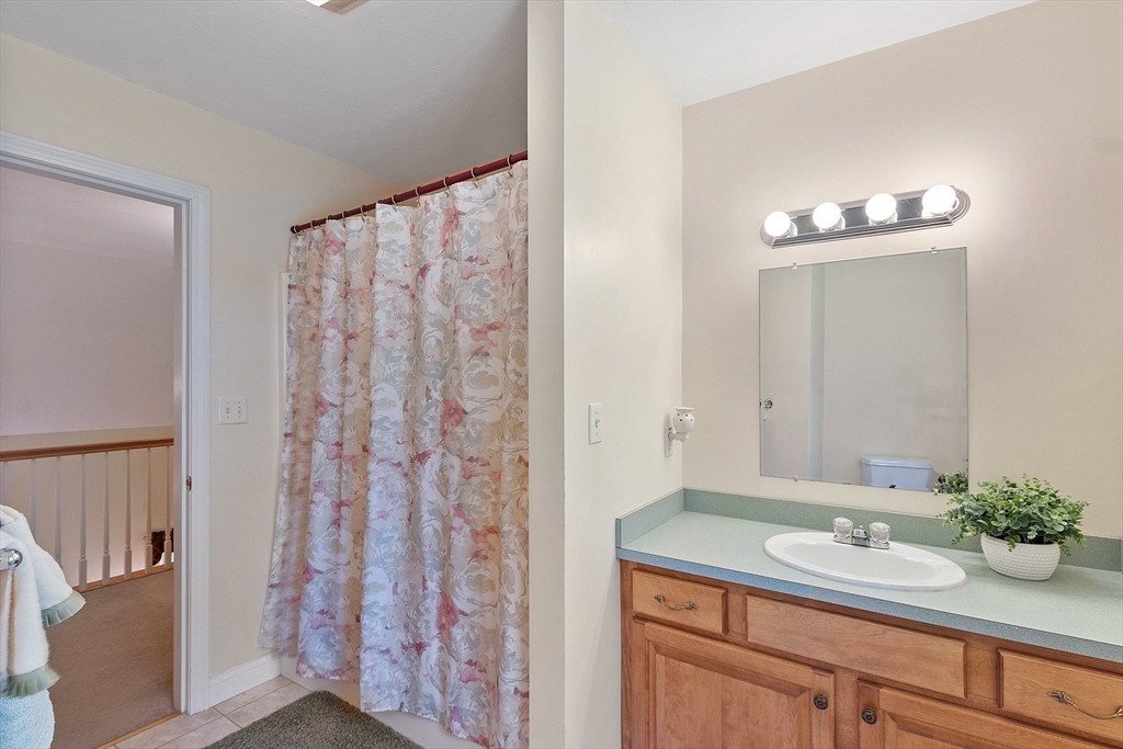 169 Narrows Road Westminster, MA 01473 - Photo 24 of 41 a bathroom with a sink and a mirror