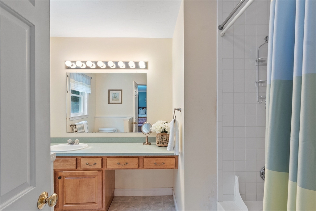 169 Narrows Road Westminster, MA 01473 - Photo 32 of 41 a bathroom with a sink and a mirror