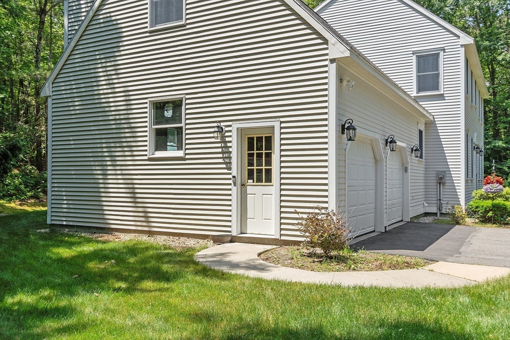 169 Narrows Road Westminster, MA 01473 - Photo 36 of 41 a view of a house with a yard and plants