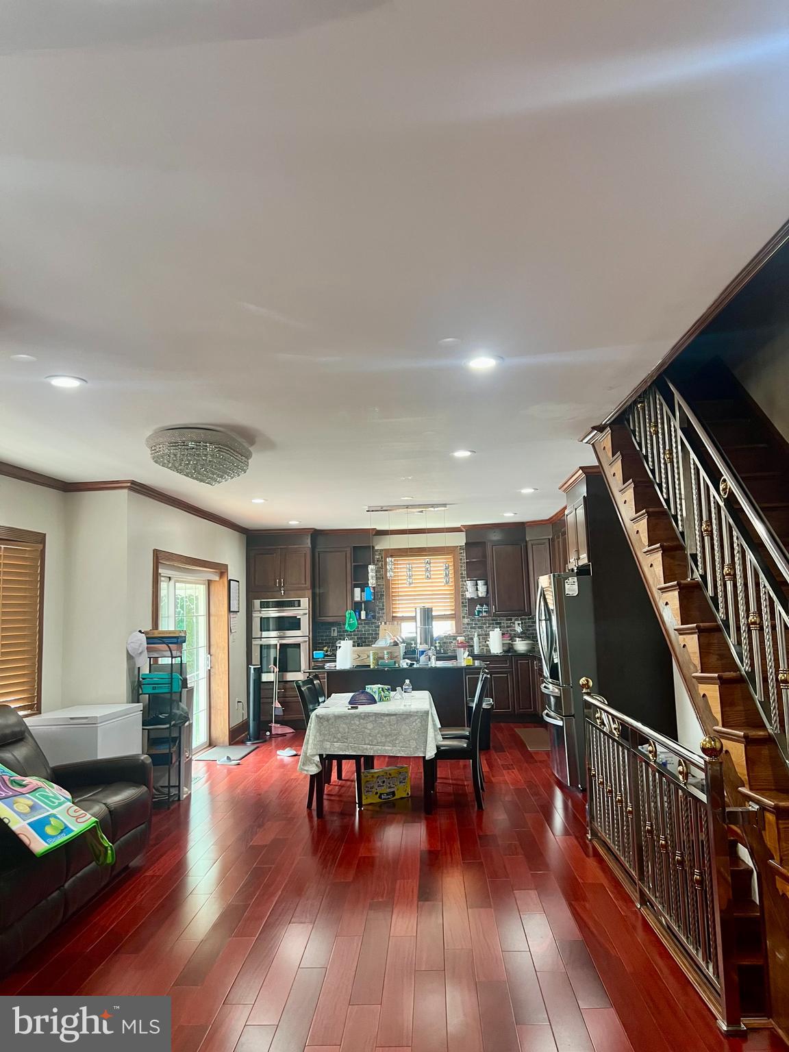 330 Sanger Street Philadelphia, PA 19120 - Photo 14 of 18 a living room with furniture and a wooden floor
