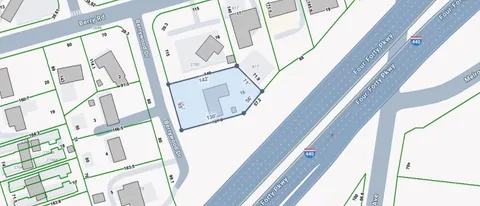 a view of a balcony with wooden floor and door