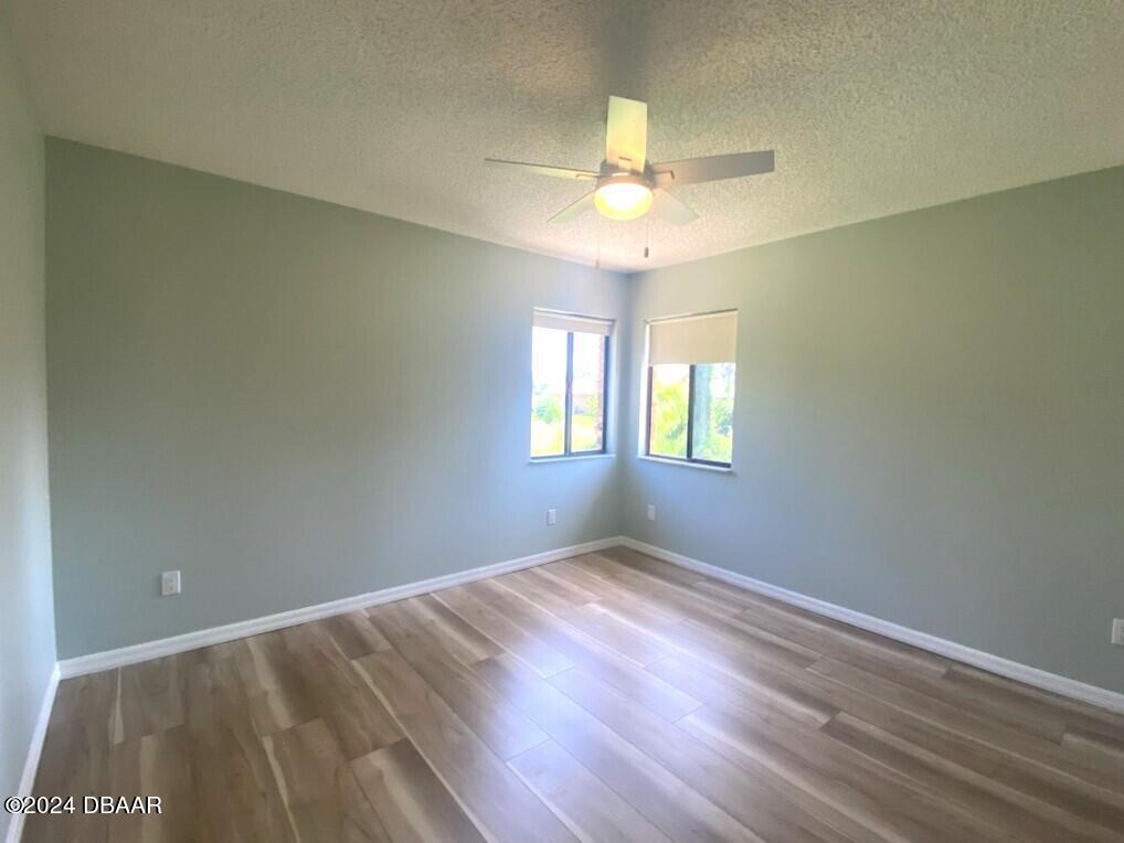 12 Julie Drive Ormond Beach, FL 32176 - Photo 18 of 24 a view of an empty room with a window