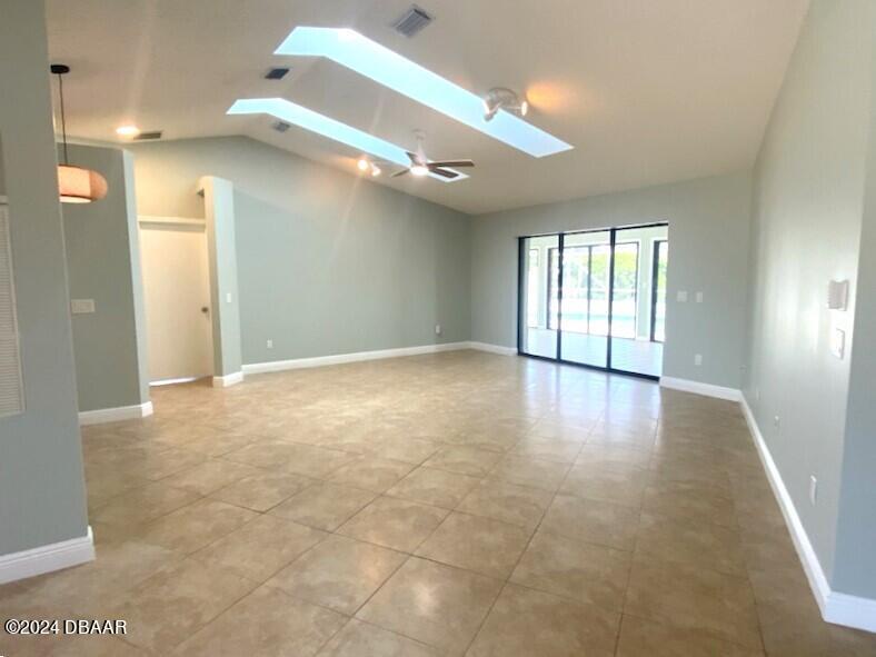 12 Julie Drive Ormond Beach, FL 32176 - Photo 2 of 24 a view of a hallway with windows