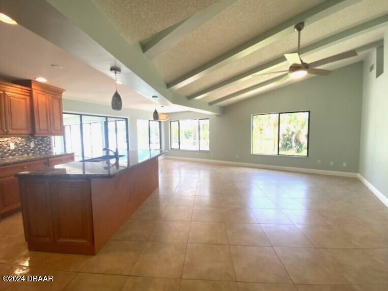 12 Julie Drive Ormond Beach, FL 32176 - Photo 9 of 24 a view of an empty room with a window
