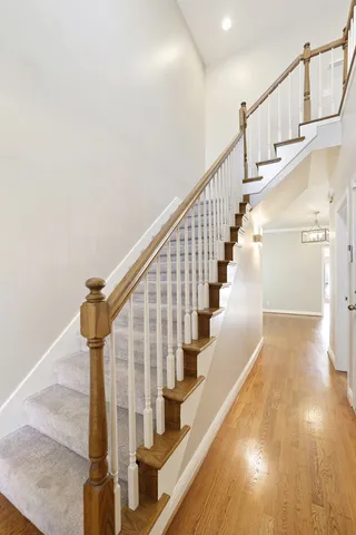 a view of an empty room with a fireplace