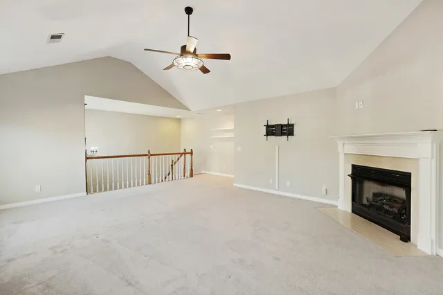 a bathroom with a shower a toilet and a shower