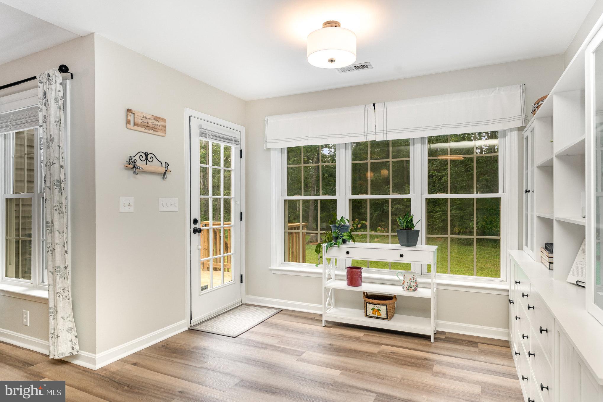 102 Parliament Street Locust Grove, VA 22508 - Photo 13 of 29 a living room with furniture and a window