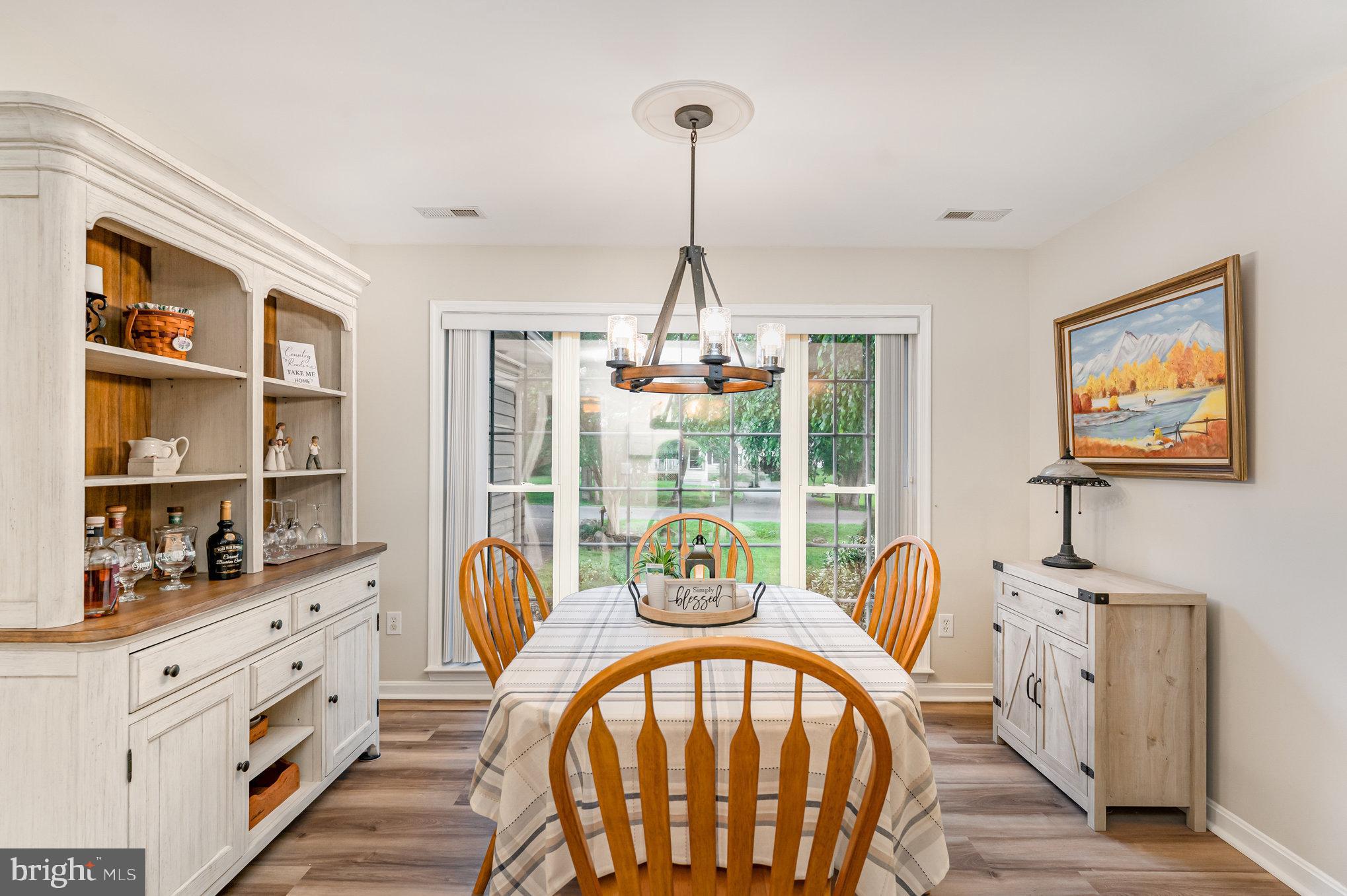 102 Parliament Street Locust Grove, VA 22508 - Photo 8 of 29 a view of a dining room with furniture window and outside view