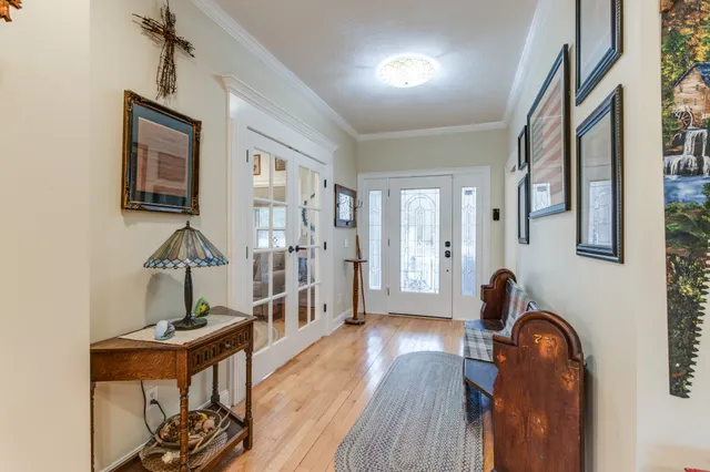 a kitchen with a refrigerator and a sink