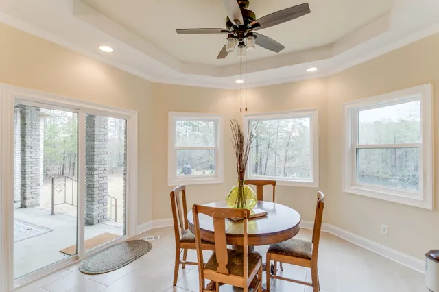a bathroom with a granite countertop sink mirror and double