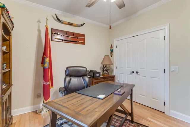an aerial view of a house with a lake view