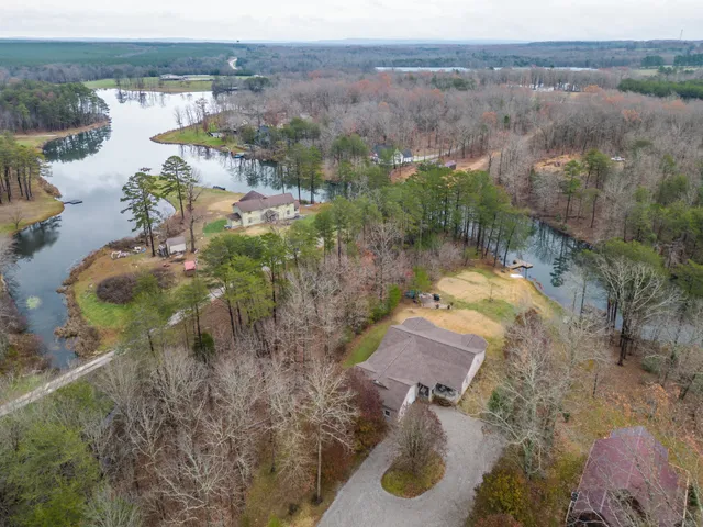 a lake view with a garden