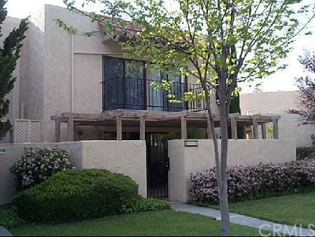 7017 Poco Senda Riverside, CA 92506 - Photo 1 of 1 a front view of a house with garden