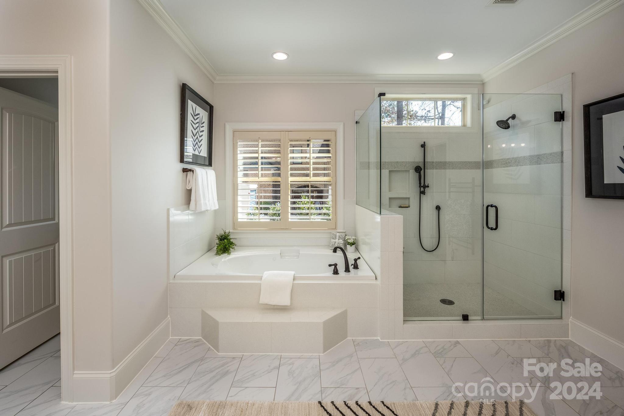 320 Barber Loop Mooresville, NC 28117 - Photo 18 of 44 a spacious bathroom with a bathtub and shower