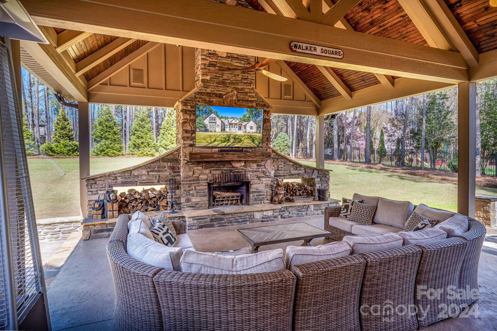 320 Barber Loop Mooresville, NC 28117 - Photo 22 of 44 a outdoor space with patio the couches and a fireplace