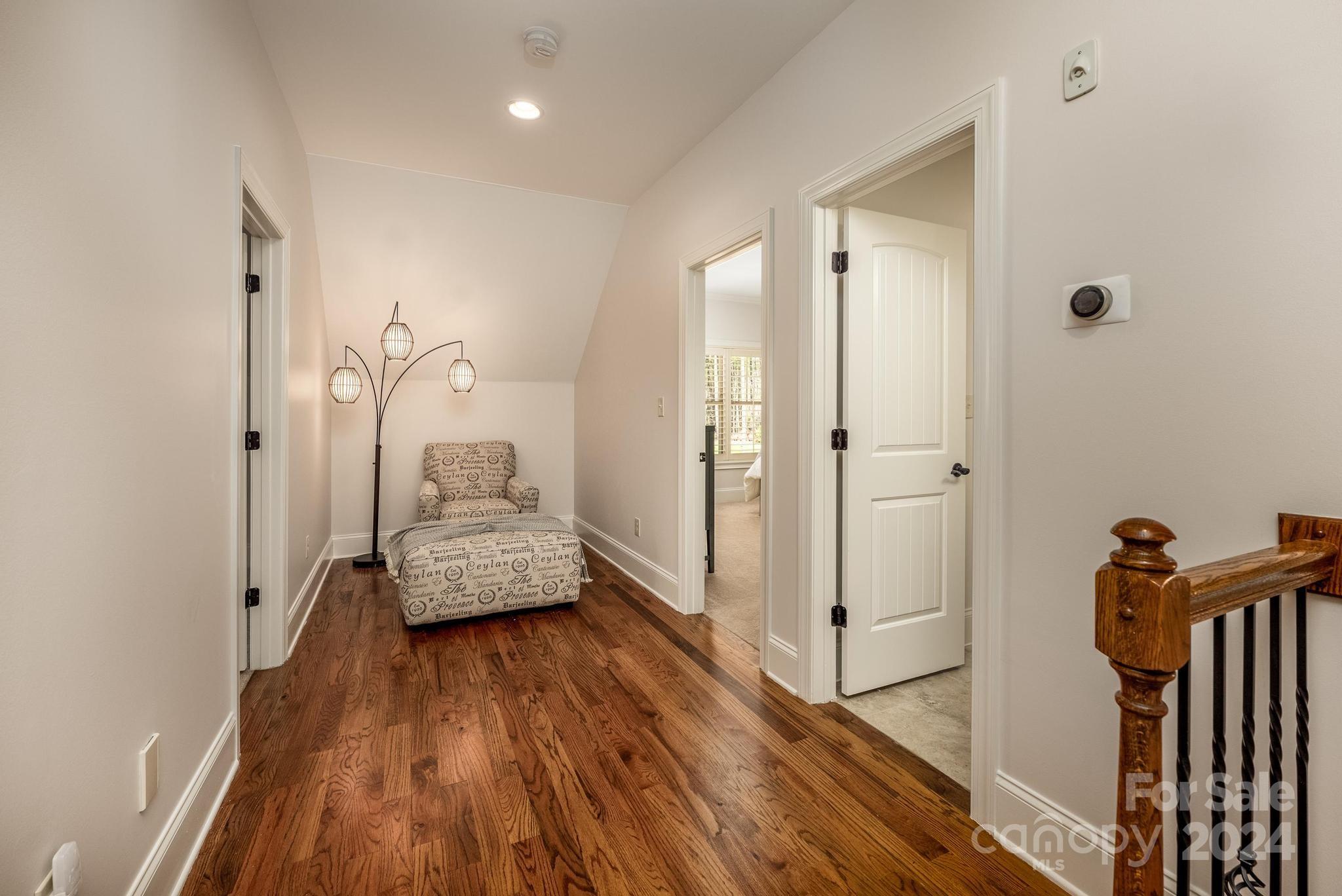 320 Barber Loop Mooresville, NC 28117 - Photo 27 of 44 a bedroom with a bed and a wooden floor
