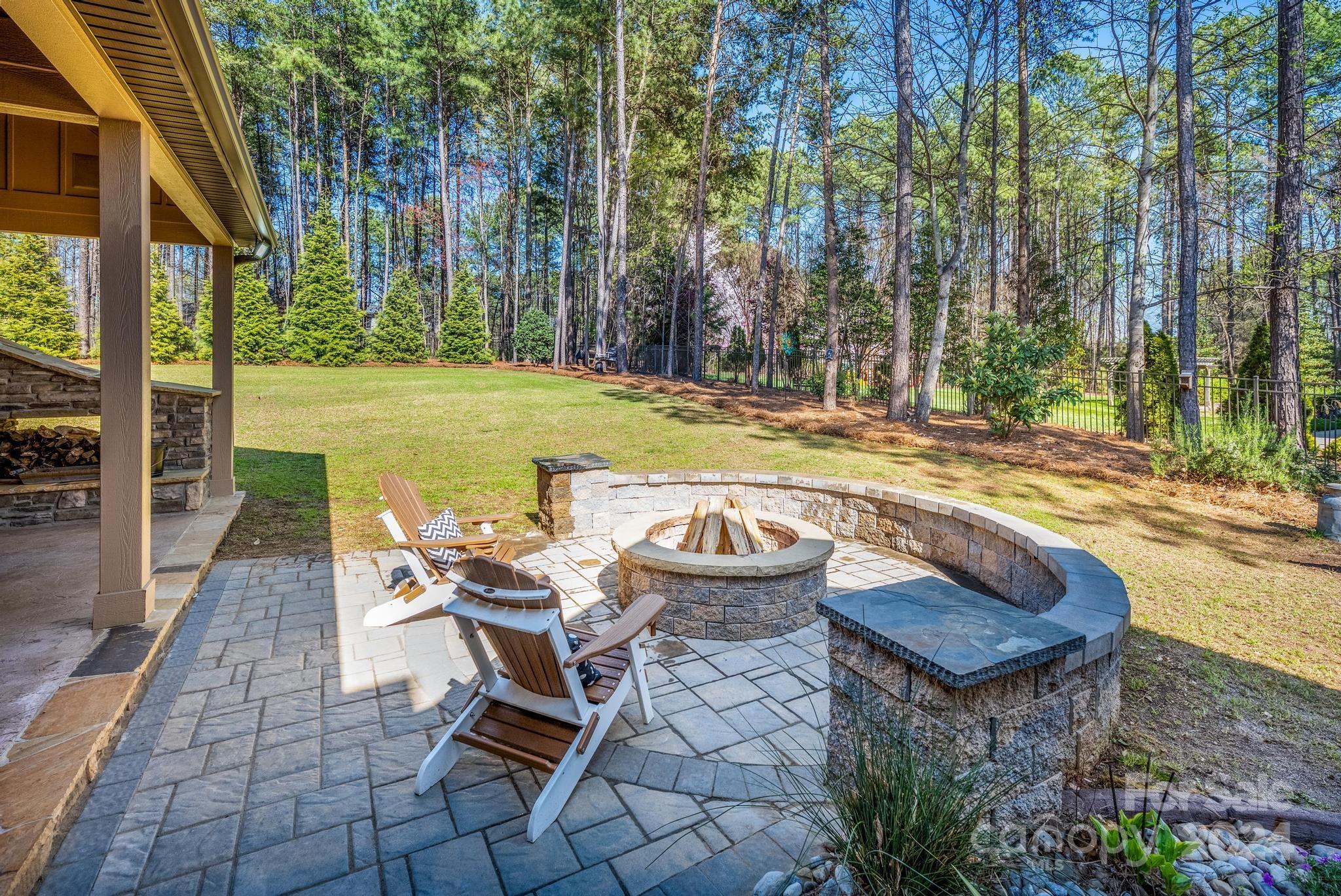 320 Barber Loop Mooresville, NC 28117 - Photo 36 of 44 a view of a swimming pool with lounge chair