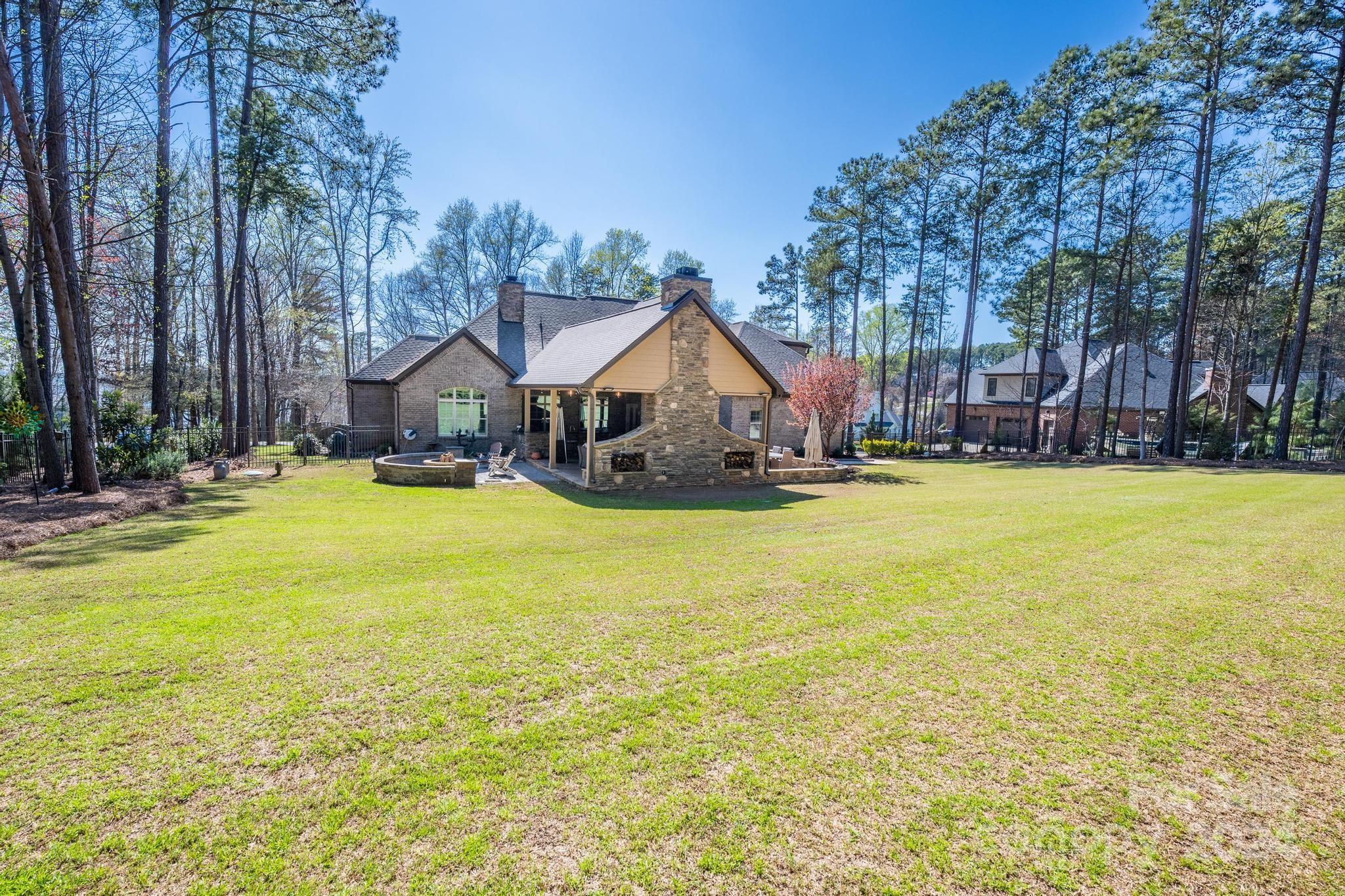 320 Barber Loop Mooresville, NC 28117 - Photo 42 of 44 a view of a house with a yard and swimming pool