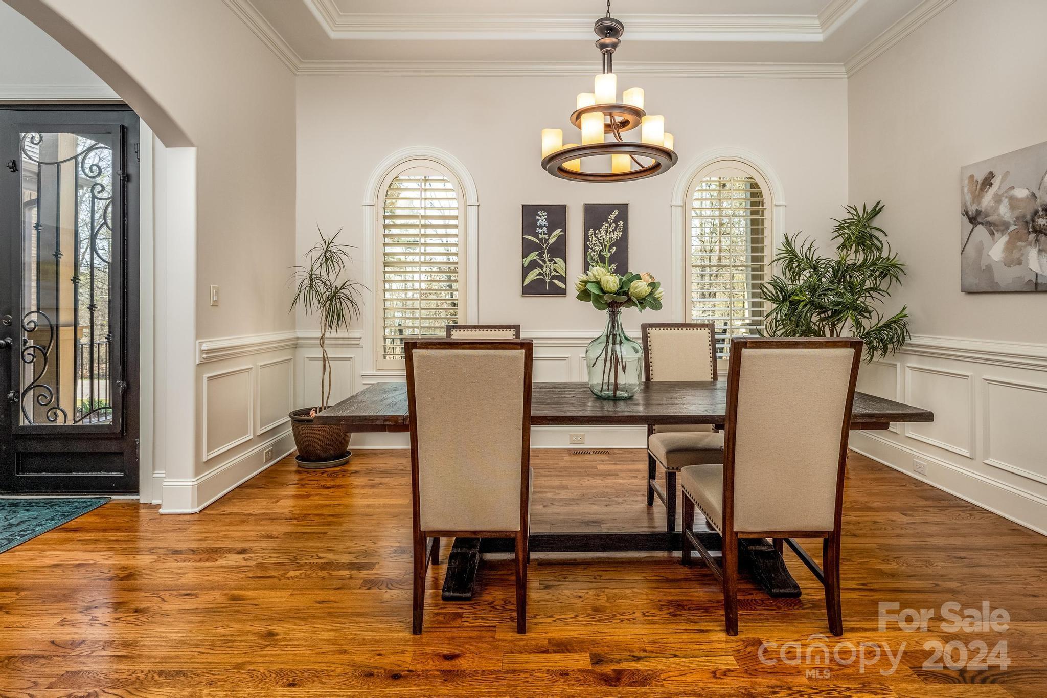 320 Barber Loop Mooresville, NC 28117 - Photo 7 of 44 a view of a dining room with furniture window and wooden floor