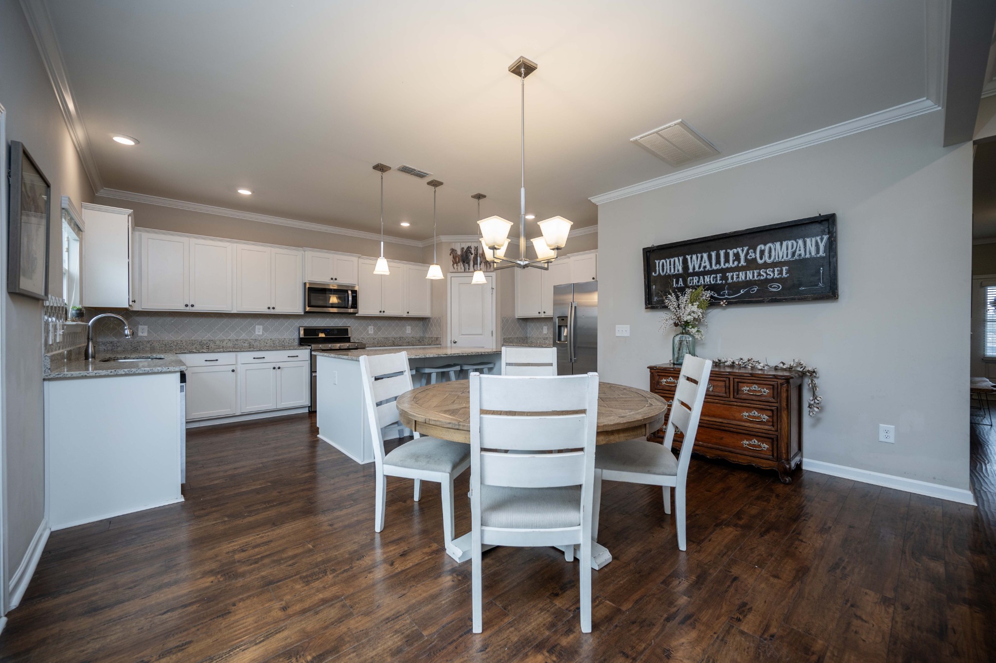 416 Butler Road Mount Juliet, TN 37122 - Photo 16 of 46 a view of a dining room with furniture and wooden floor