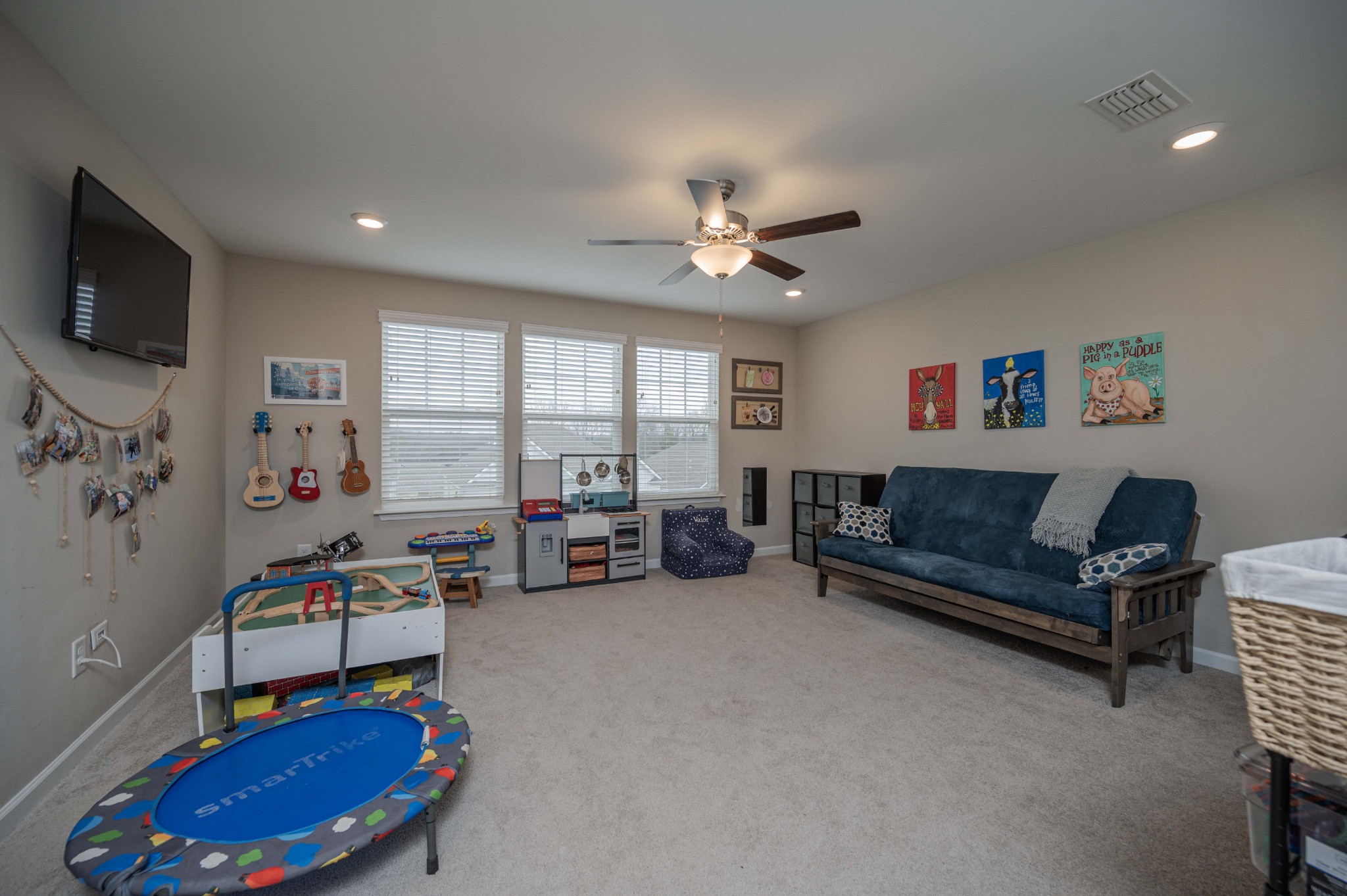 416 Butler Road Mount Juliet, TN 37122 - Photo 23 of 46 a living room with furniture and a flat screen tv