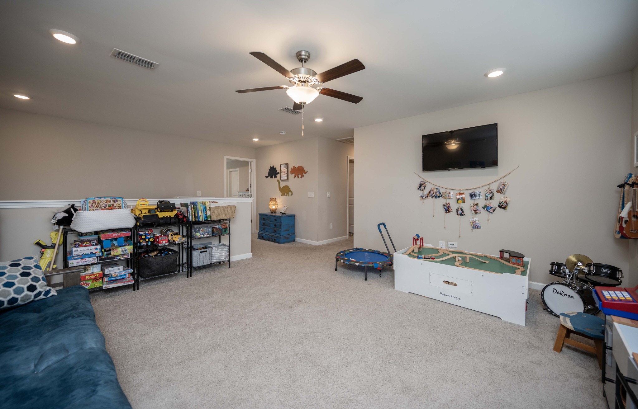 416 Butler Road Mount Juliet, TN 37122 - Photo 25 of 46 a bedroom with furniture and a flat screen tv