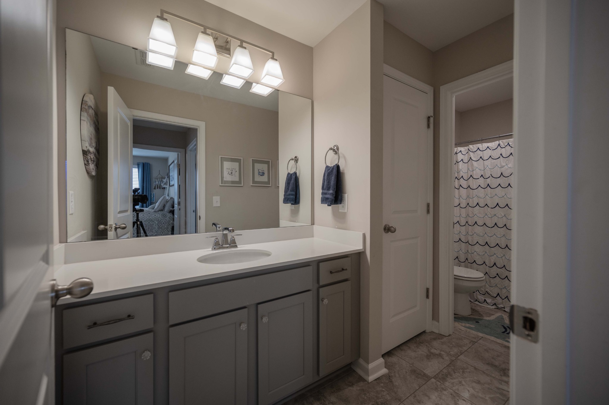 416 Butler Road Mount Juliet, TN 37122 - Photo 35 of 46 a bathroom with a sink and a mirror