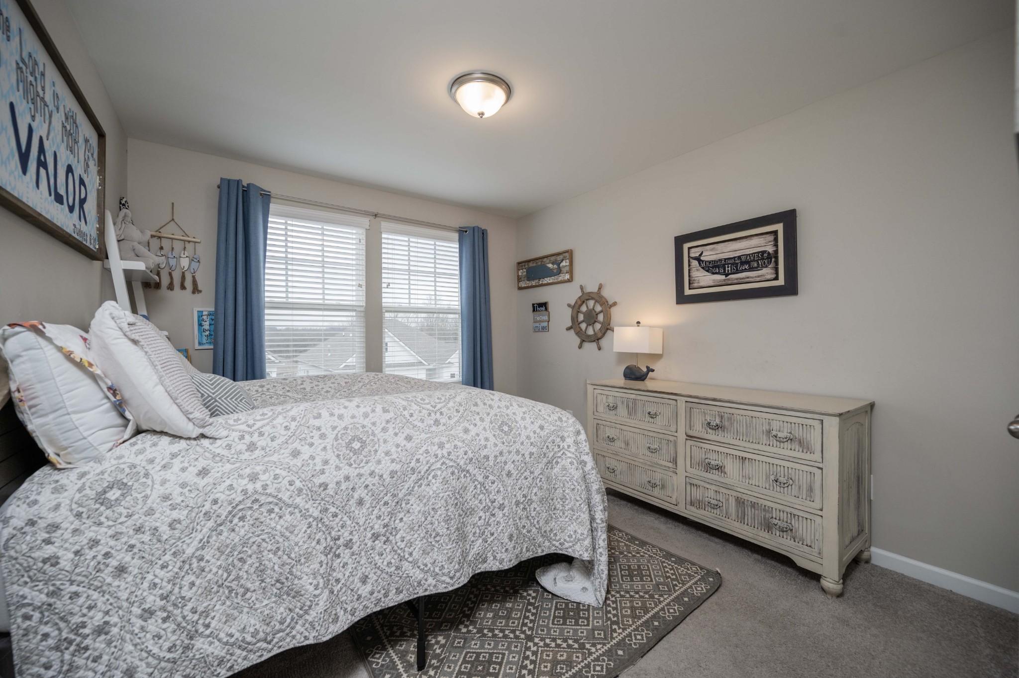 416 Butler Road Mount Juliet, TN 37122 - Photo 37 of 46 a bedroom with a bed and a dresser