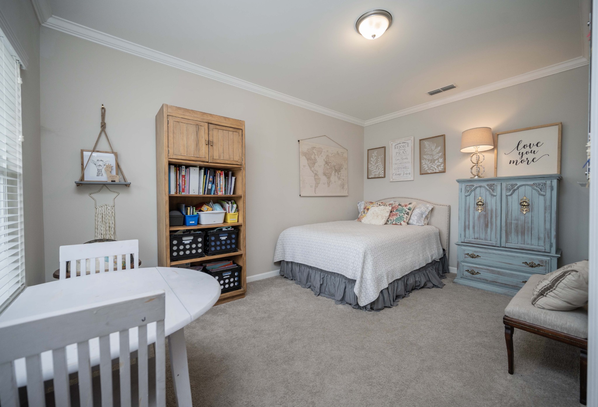 416 Butler Road Mount Juliet, TN 37122 - Photo 4 of 46 a bedroom with a bed furniture and a book shelf