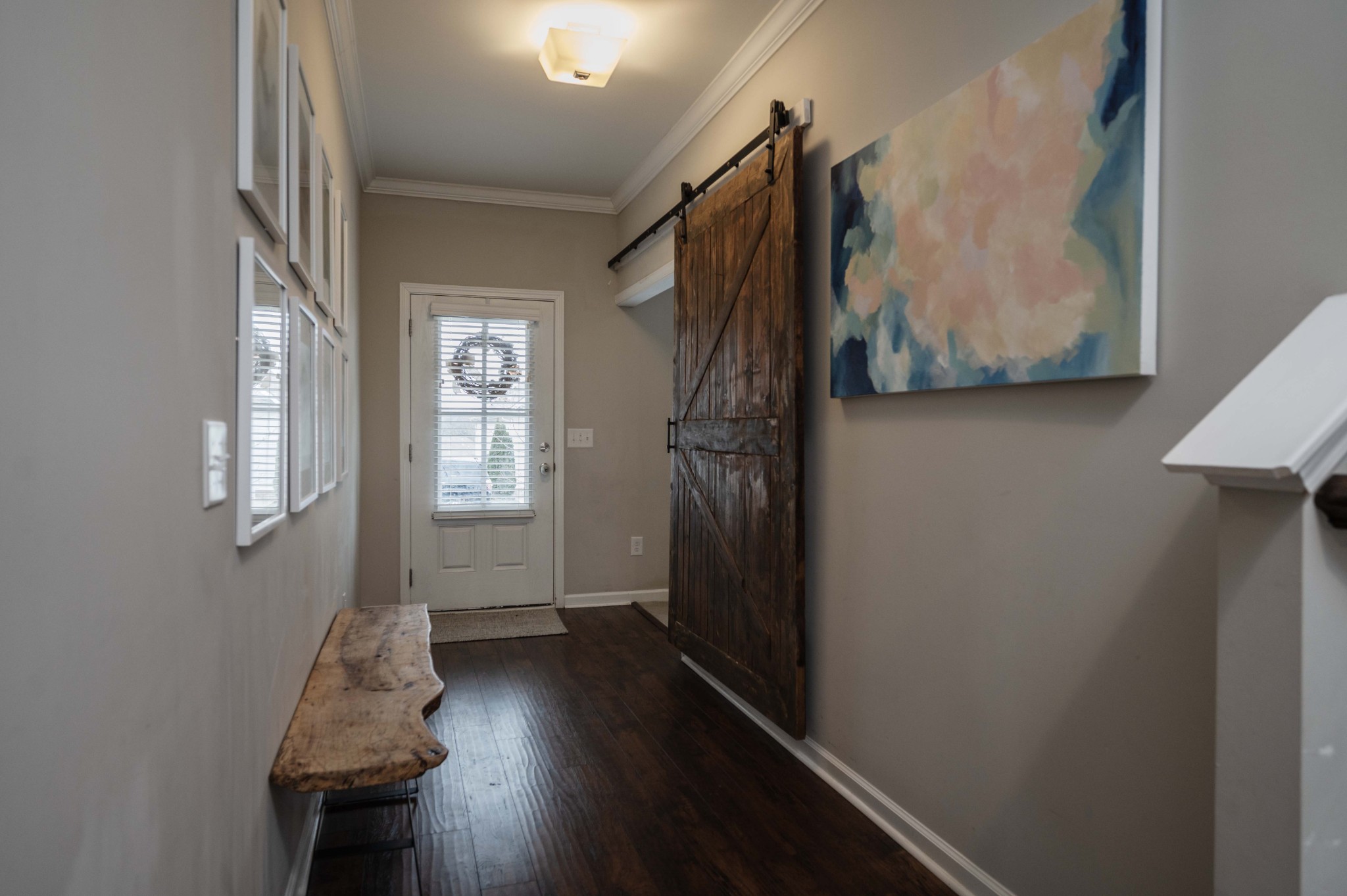 416 Butler Road Mount Juliet, TN 37122 - Photo 8 of 46 a view of hallway with window and wooden floor