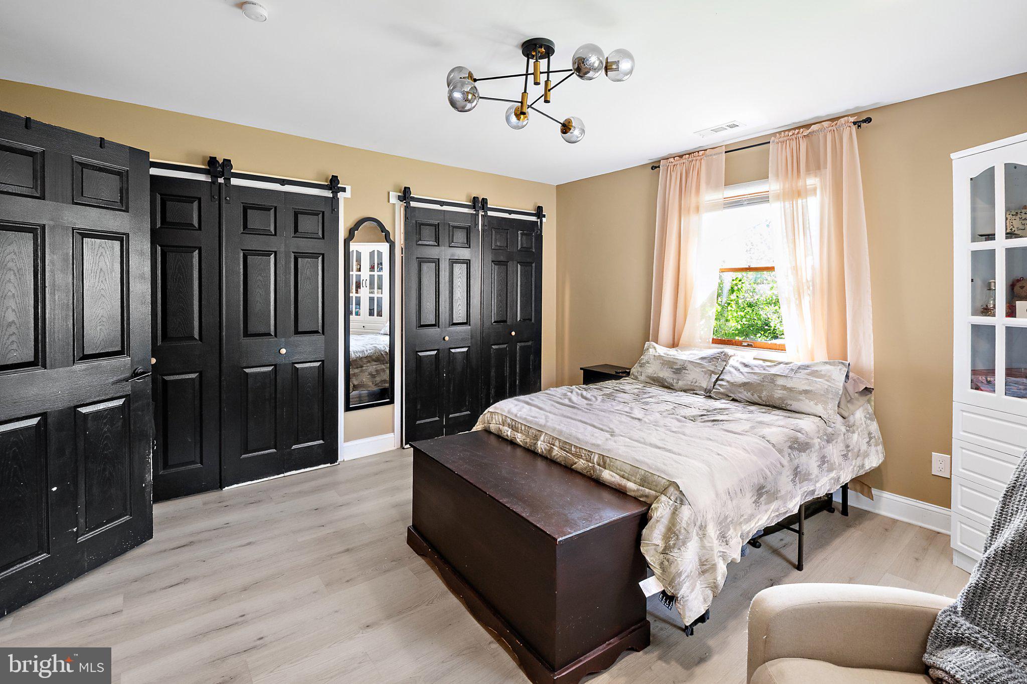 56 Gridiron Road Levittown, PA 19057 - Photo 22 of 35 Chic bedroom with bold black accents.